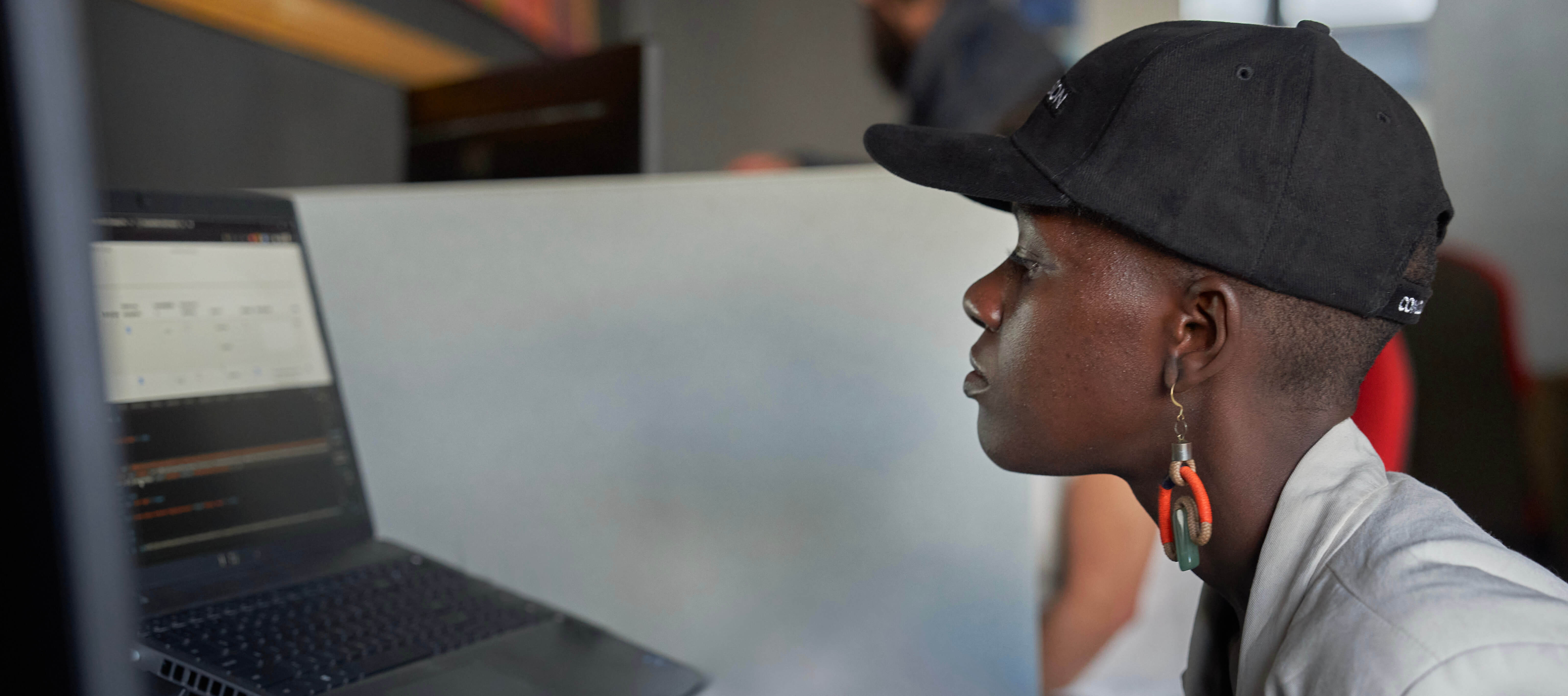 woman looking at computer screen